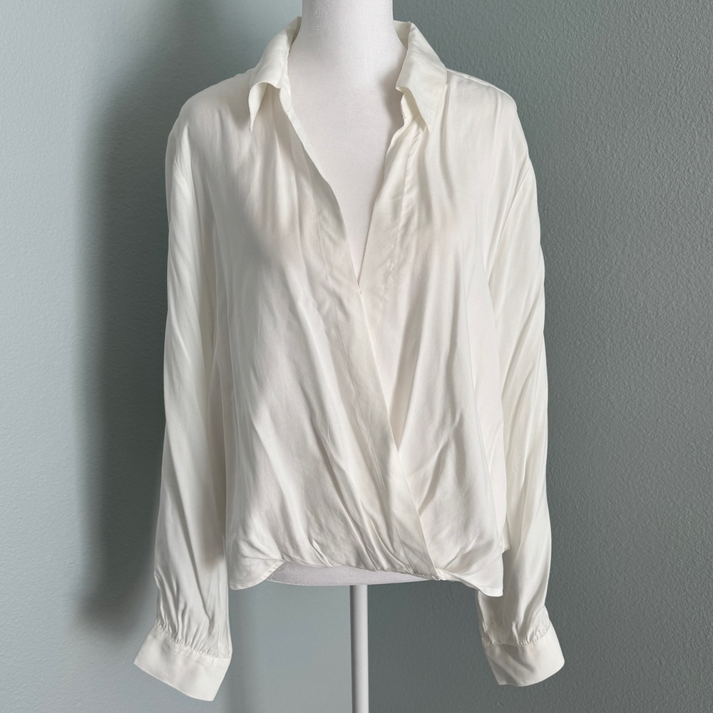 Faux wrap draped blouse with snap closure